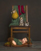 Childhood-Innocence-Nostalgia-Wonder-I-asked-mom-if-I-could-pose-her-sleepy-baby-under-a-kitchen.jpg